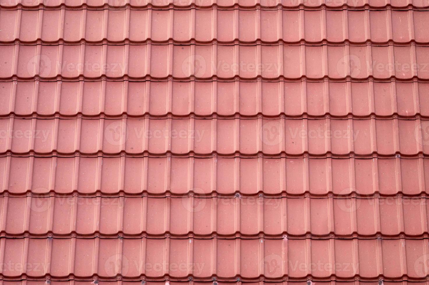 Roof tile seamless pattern covering on house photo
