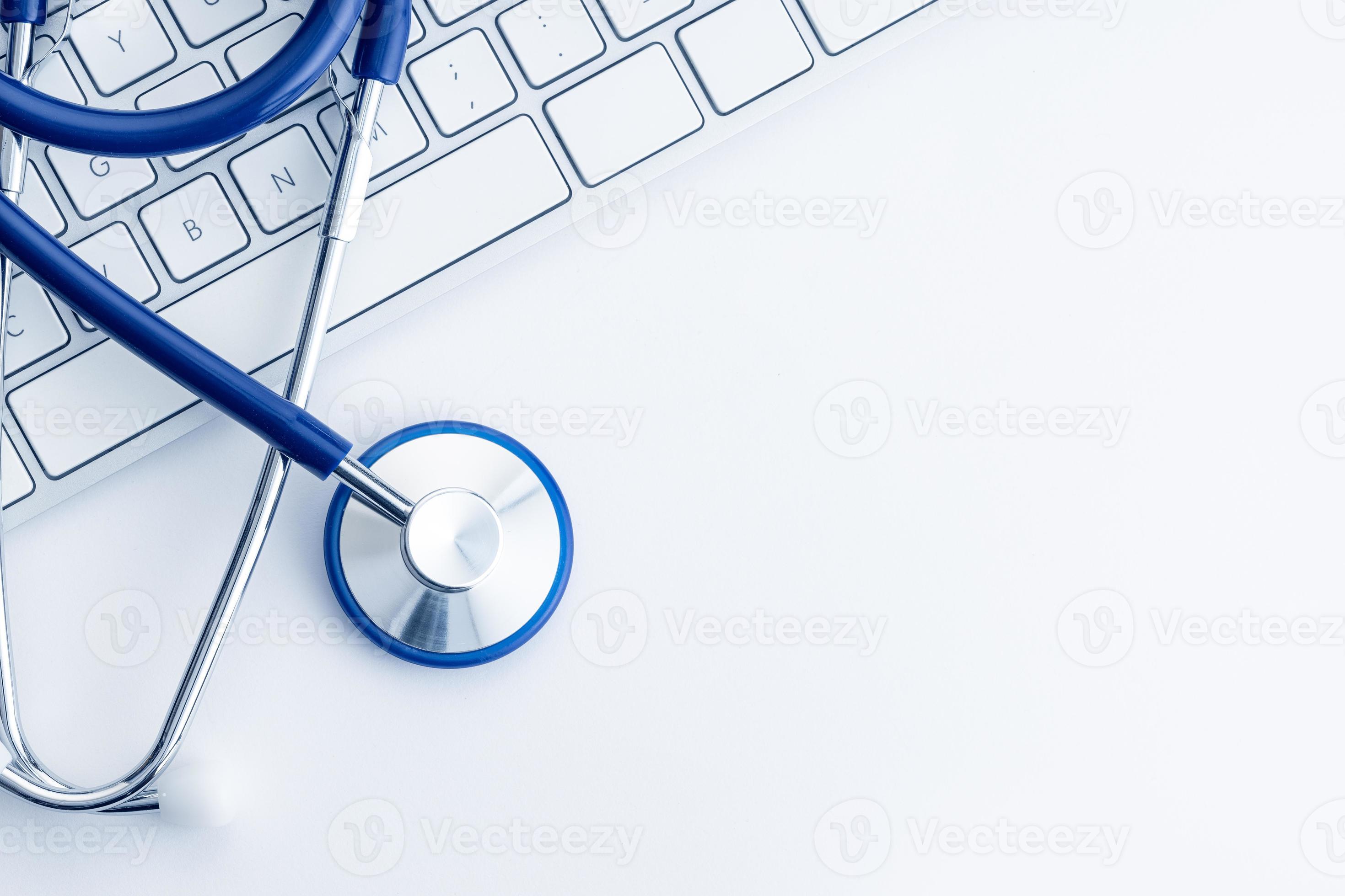 Stethoscope on computer keyboard on white desk Online health care or  telemedicine concept Medical background Top view Copy space 2528816 Stock  Photo at Vecteezy