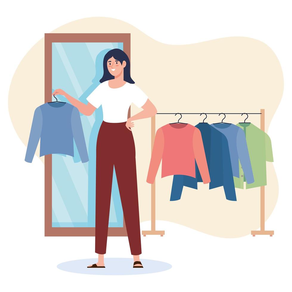 creative young woman fashion designer with hanging clothes vector