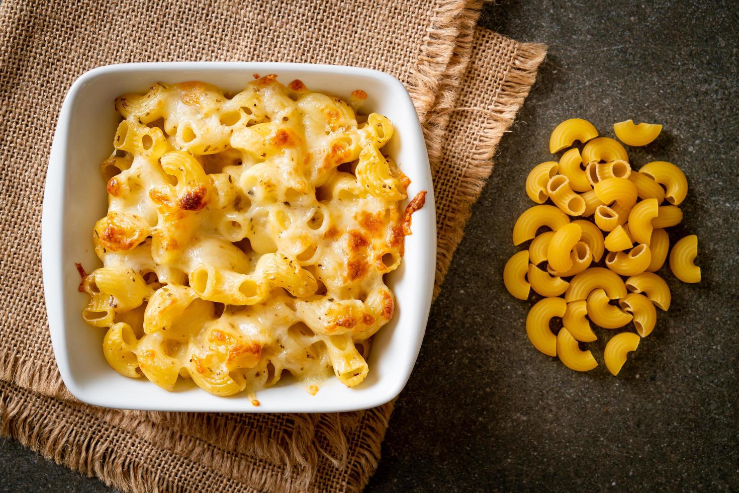 American mac and cheese macaroni pasta in cheesy sauce photo