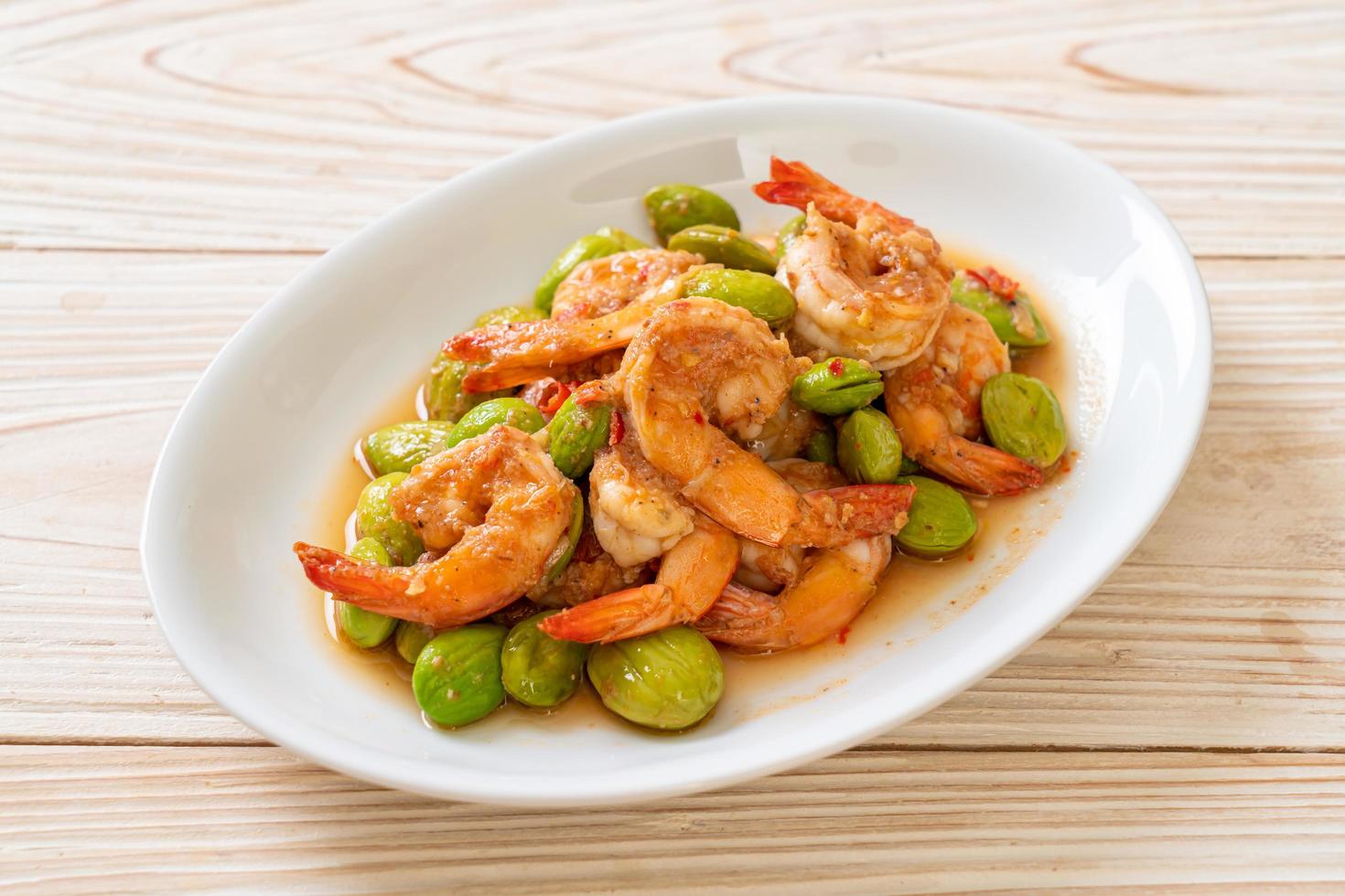 Stir-fried twisted cluster bean with shrimp - Thai food style photo