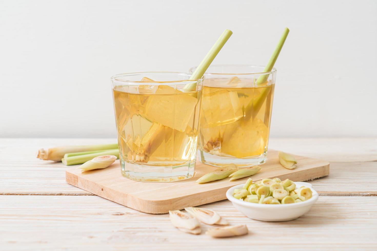 Iced lemon grass juice on a wood background photo