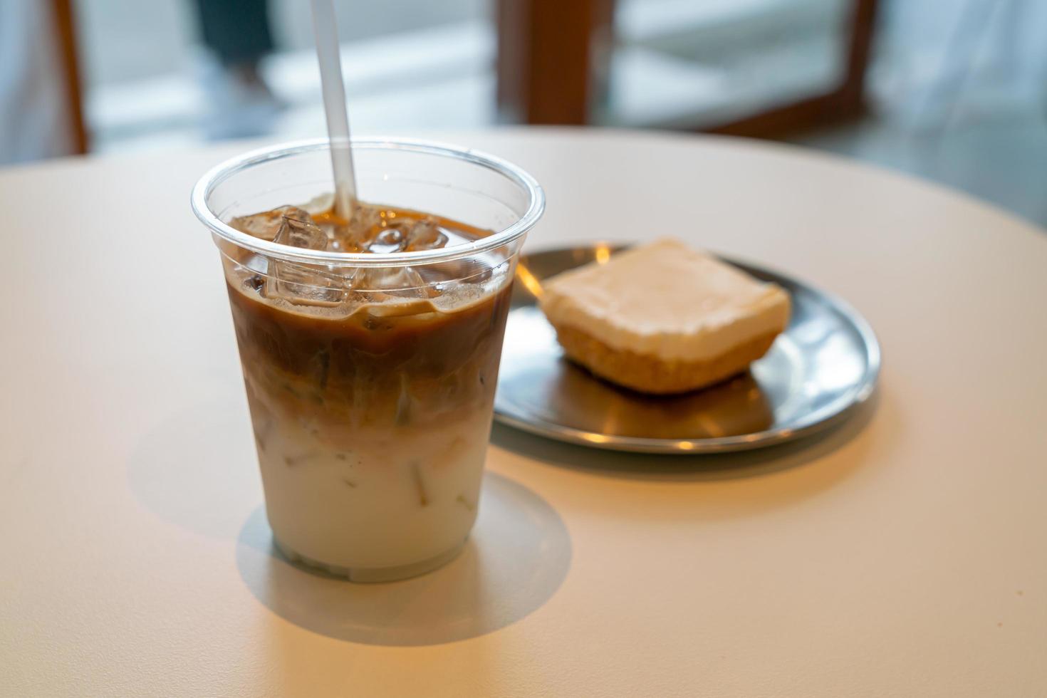 Iced latte coffee cup in cafe restaurant photo