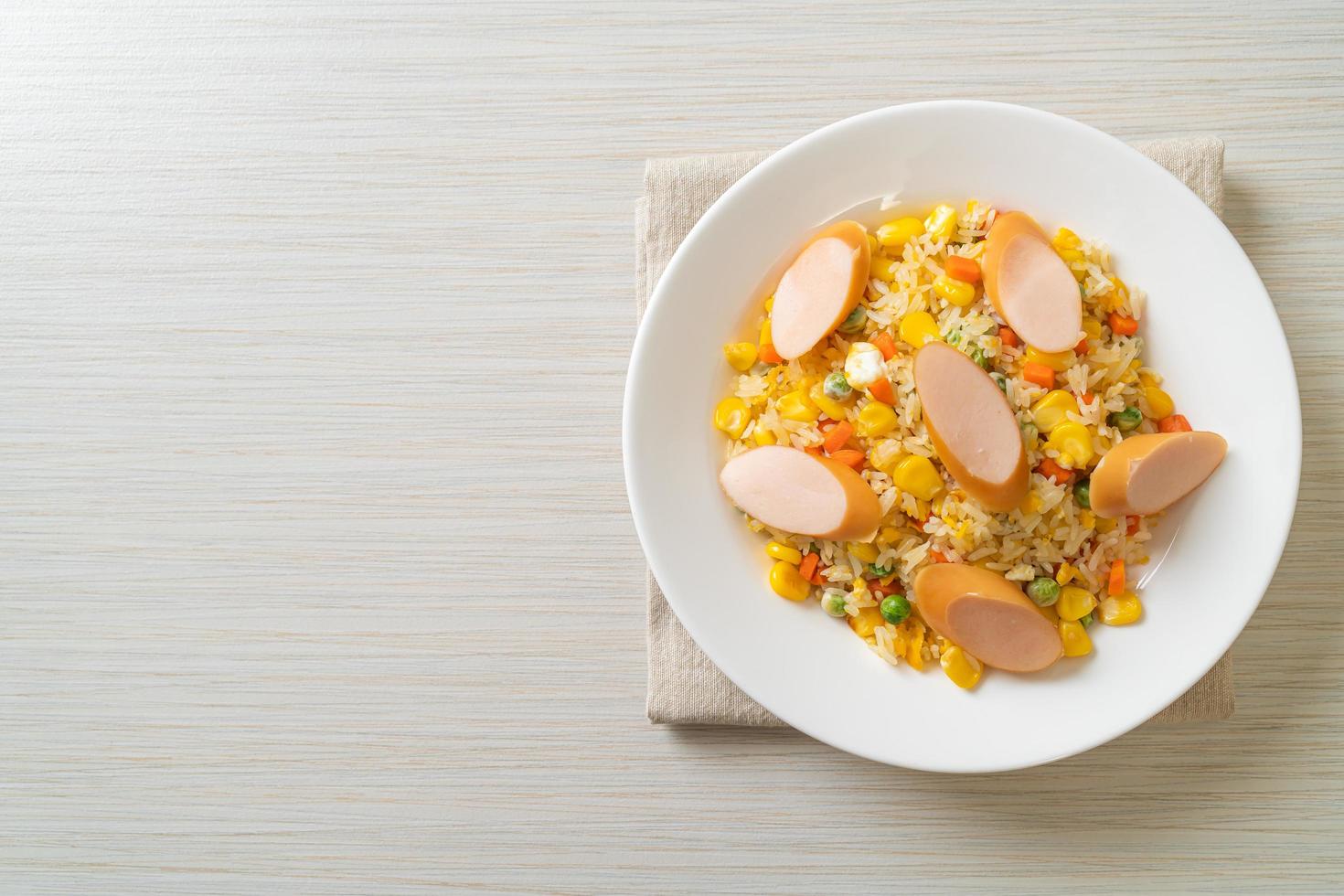Fried rice with sausage and mixed vegetables photo