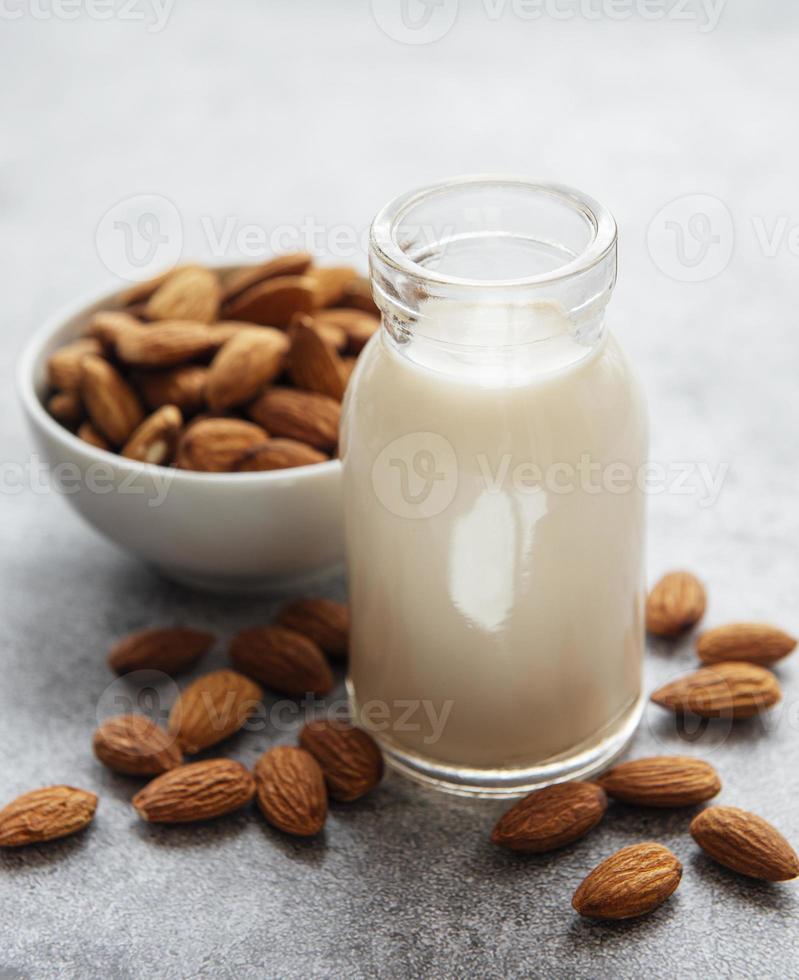 Almond milk and almonds photo