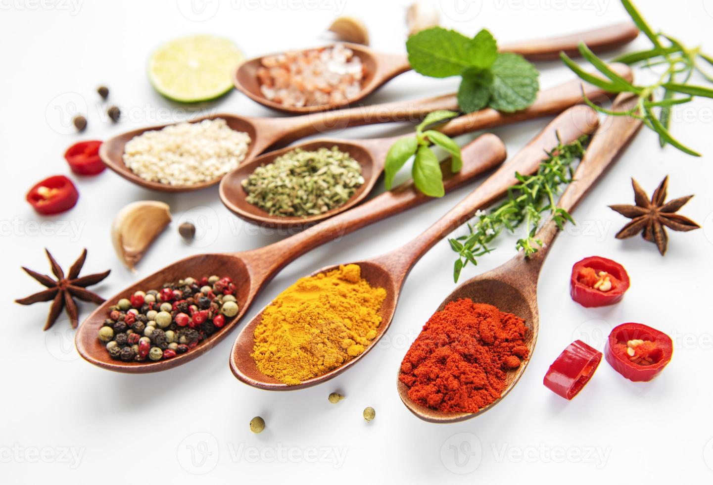 Various spices isolated on white background photo