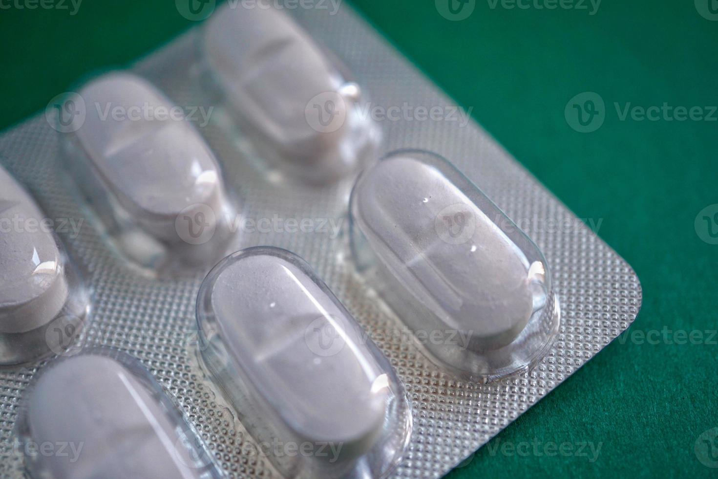 white painkillers pills medicine photo