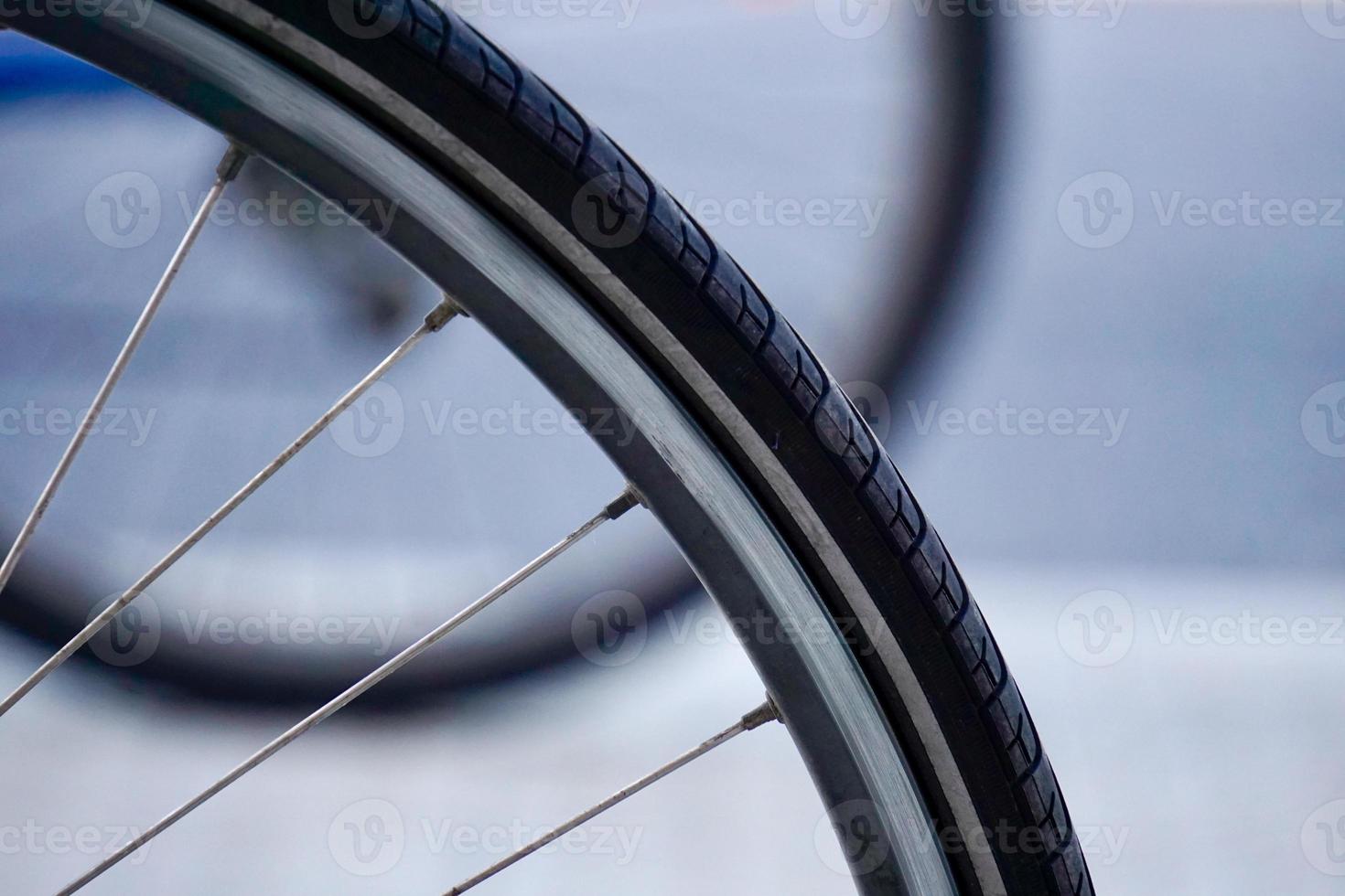 bicycle wheel on the street photo