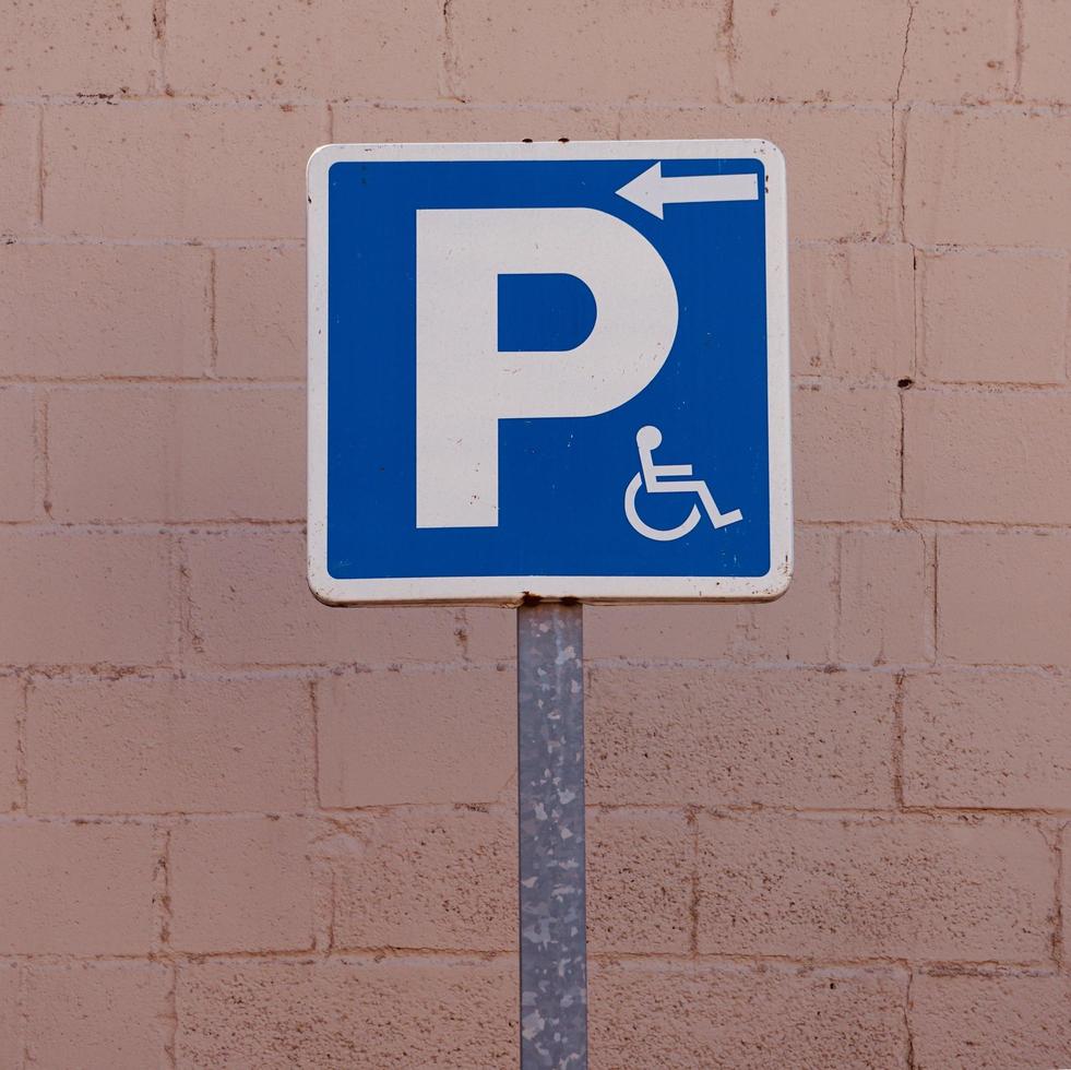 wheelchair traffic signal on the street photo