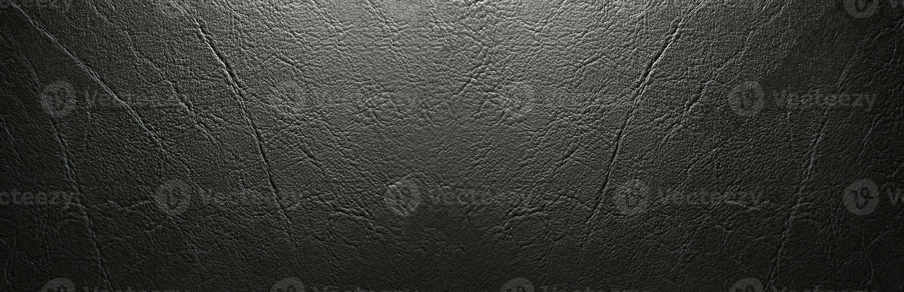 The dark leather texture and pattern background photo