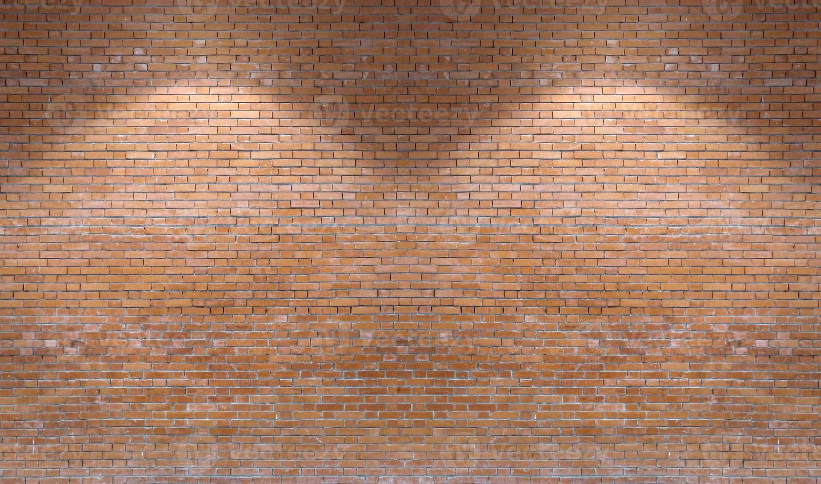Brown brick wall pattern background with downlight photo