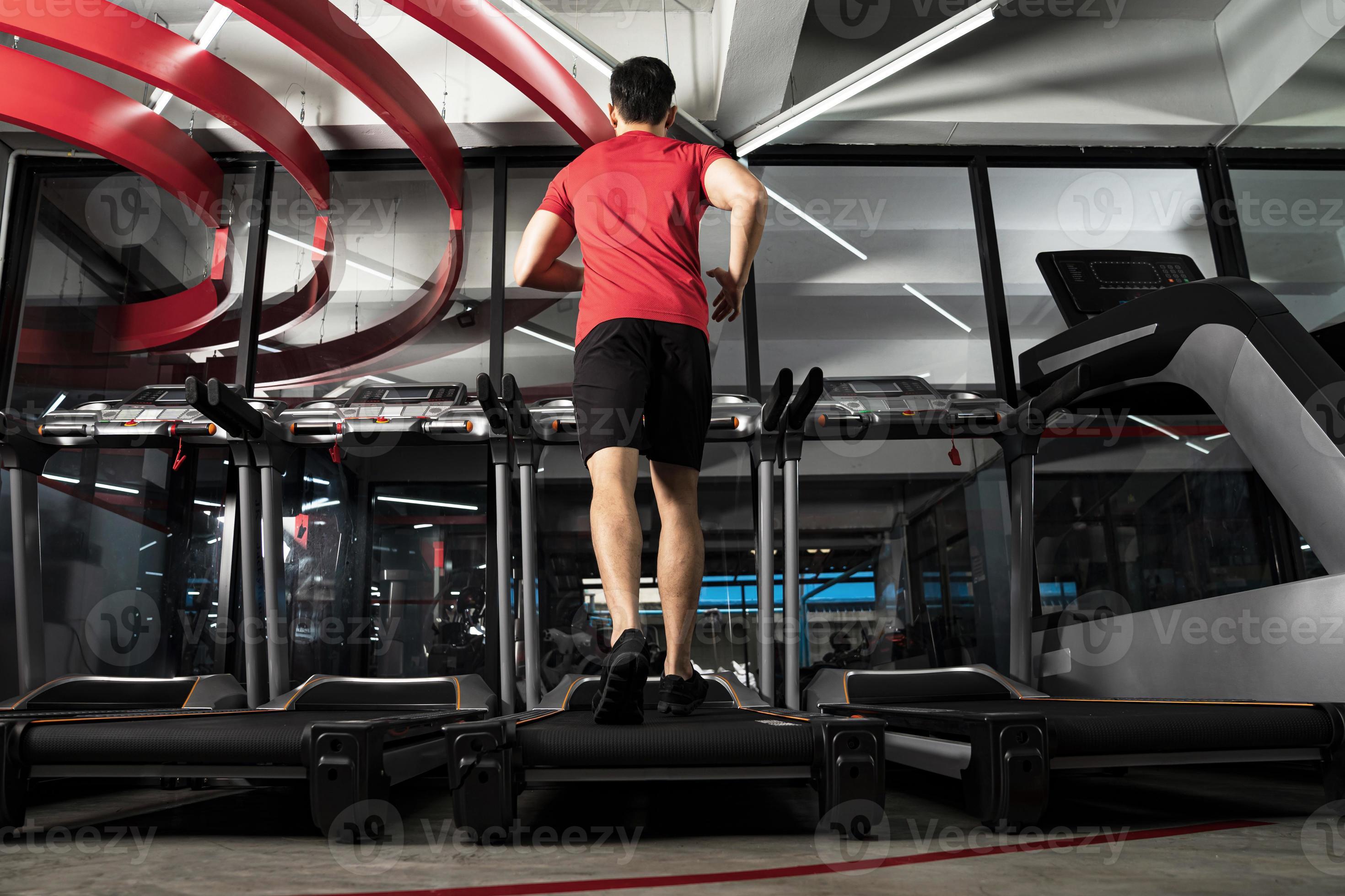 Athletic young man running in gym Sport fitness training 2544175 Stock