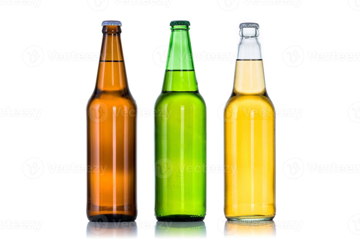 Group of Three bottles of beer isolated on white background photo