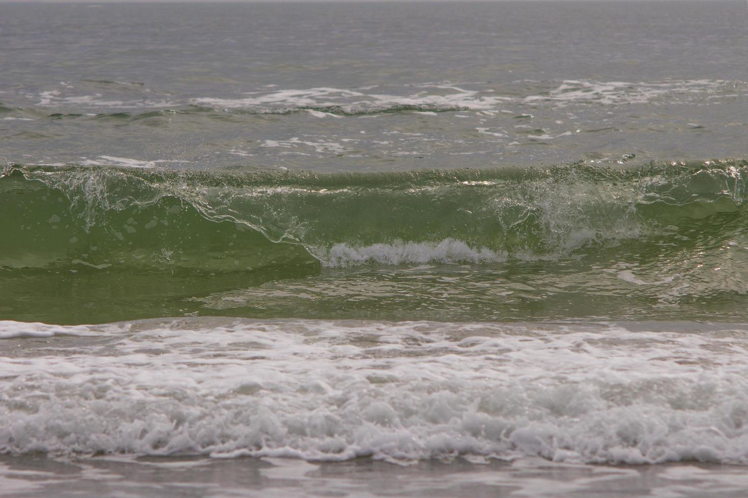turquoise waves of a raging ocean photo