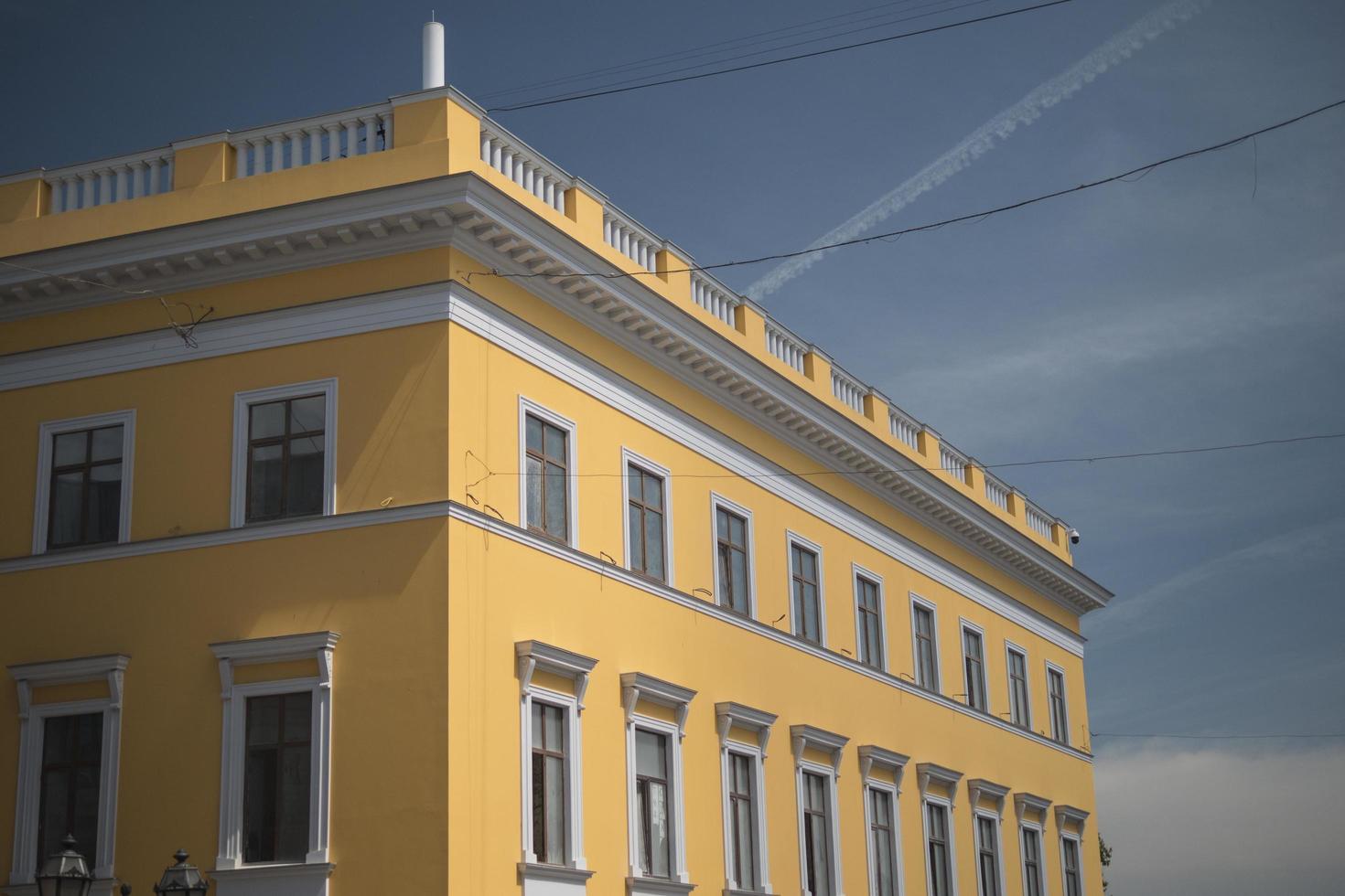 yellow building in the old city under bright sunlight photo