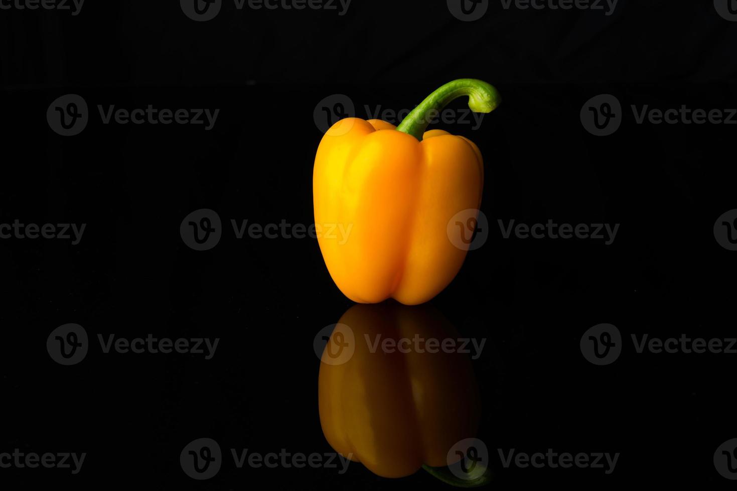 Close up Sweet Pepper on black photo