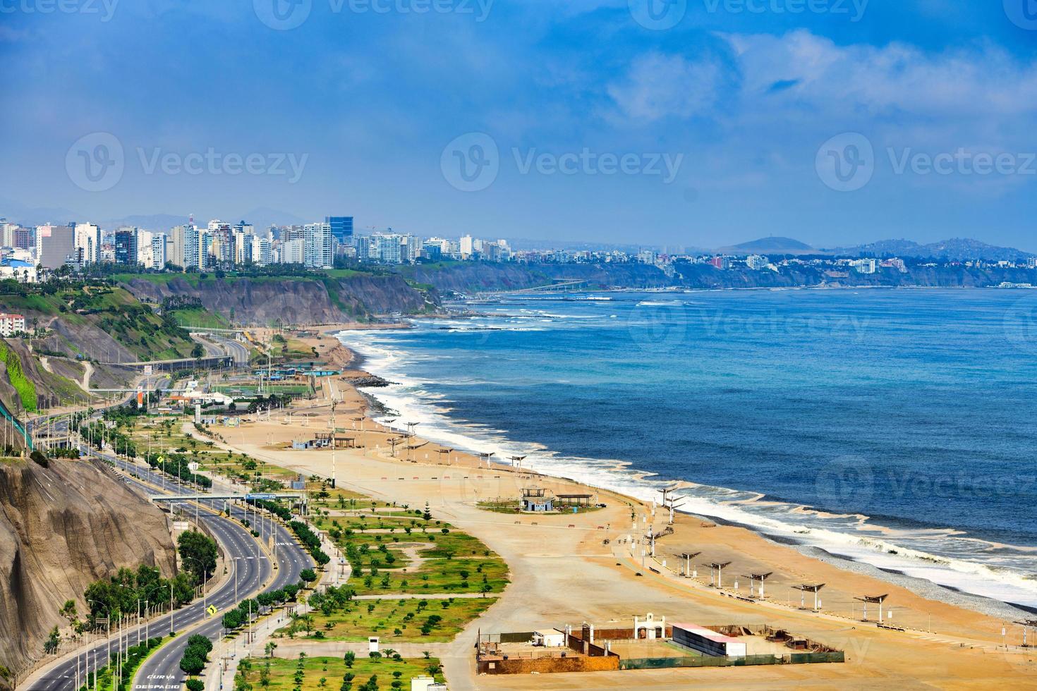 The Pacific Ocean coast of Lima Peru with the deserted road from the Covid-19 pandemic photo