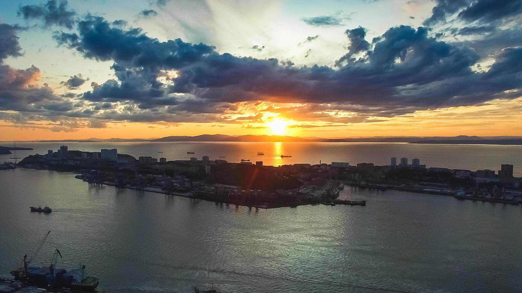 Aerial view of the cityscape at sunset photo