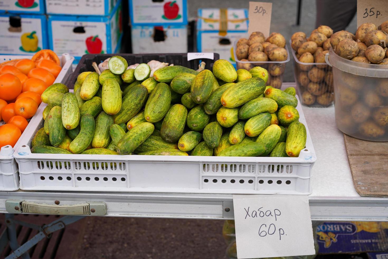 Counter with vegetables in the market of Vladivostok Russia photo