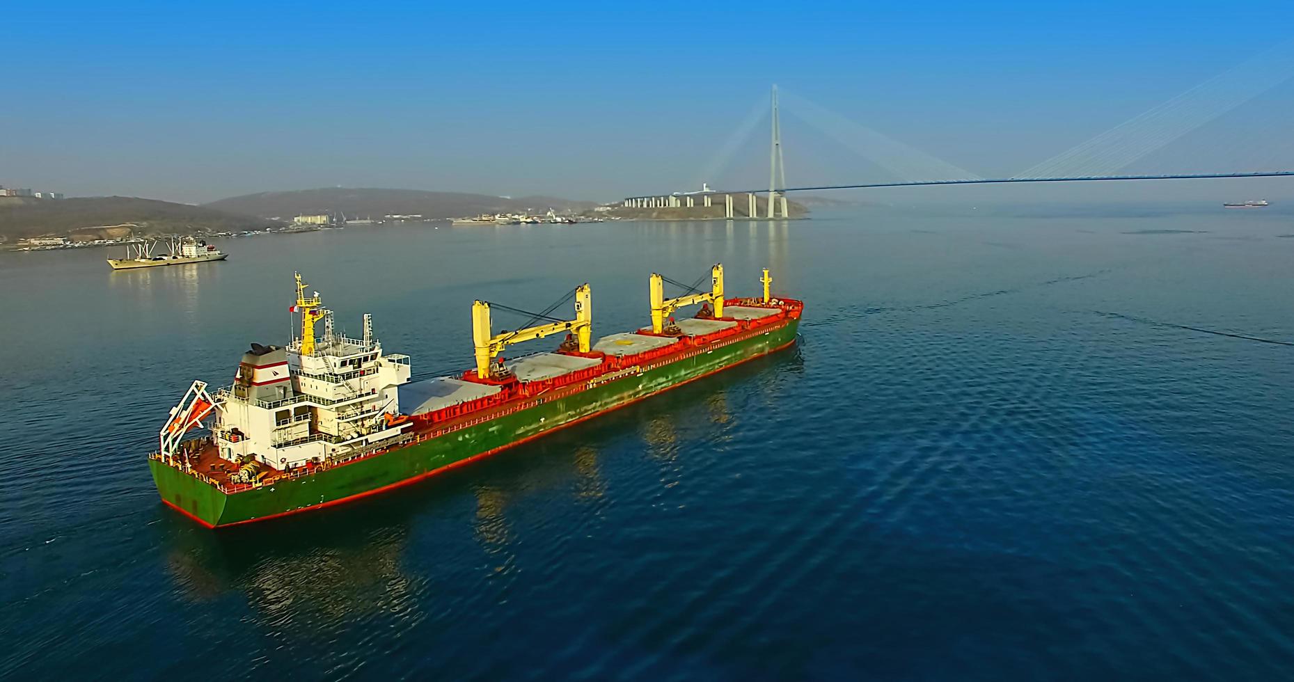 ships on the background of the Russian bridge photo