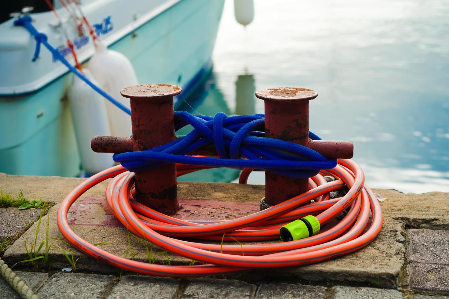 Blue ship mooring rope on a blurry background photo