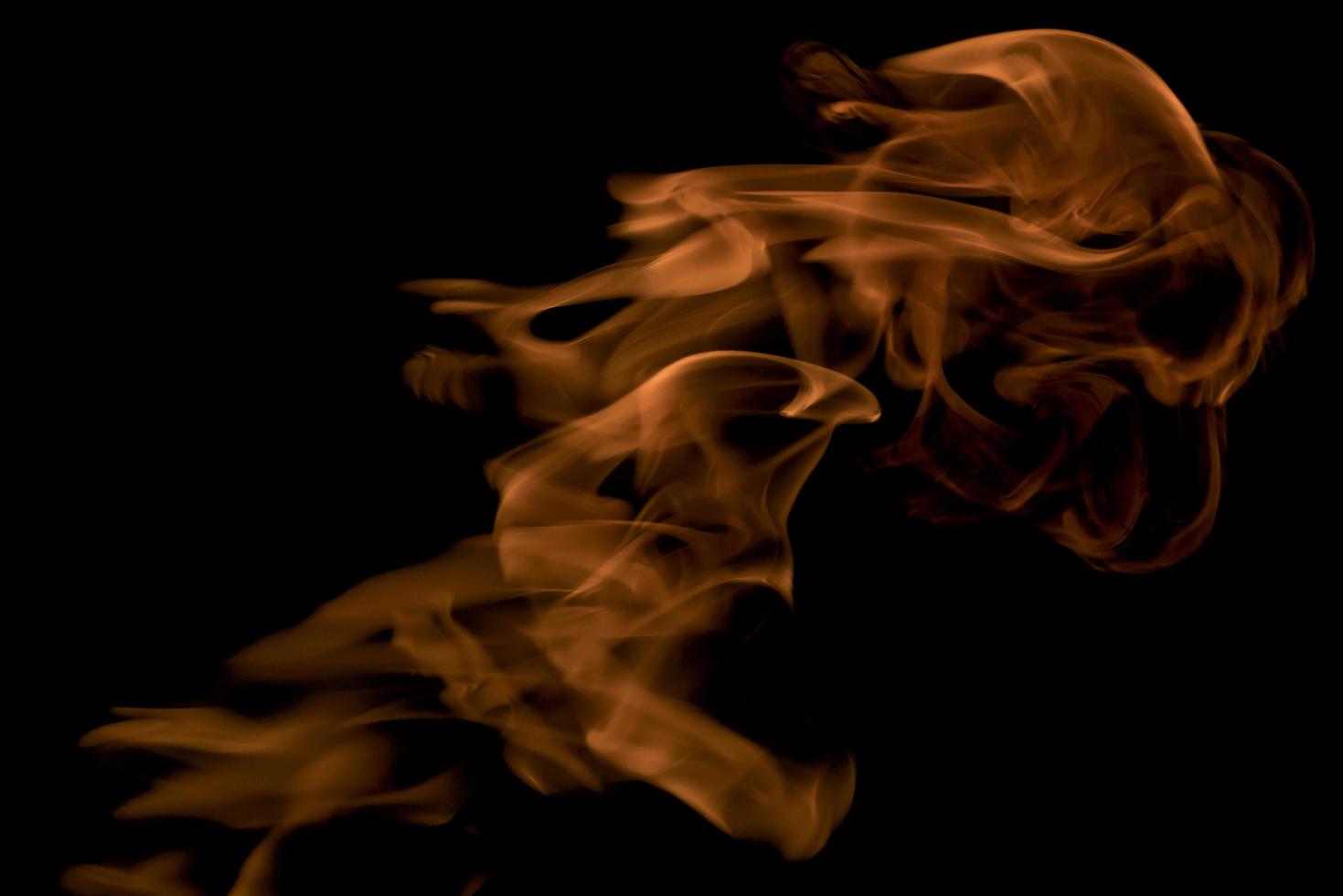 Wallpaper fire and flames on a black background photo