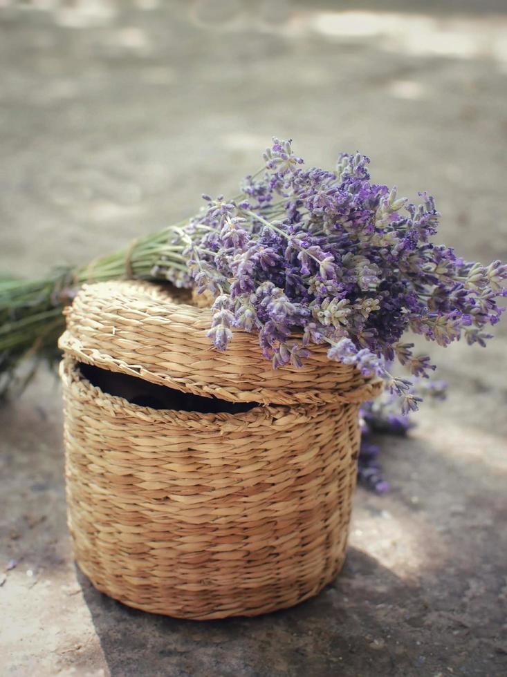 Wallpaper purple flowers on a wicker basket photo