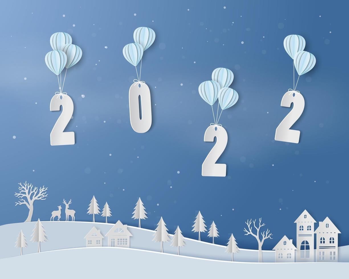 Happy new year 2022 with balloon floating above countryside on paper art background vector