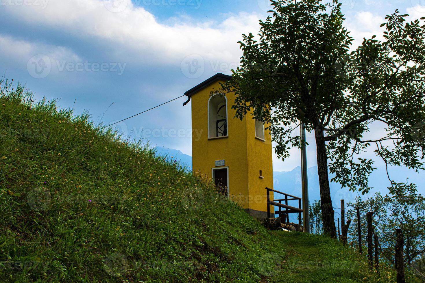 Lonely belltower with sky photo