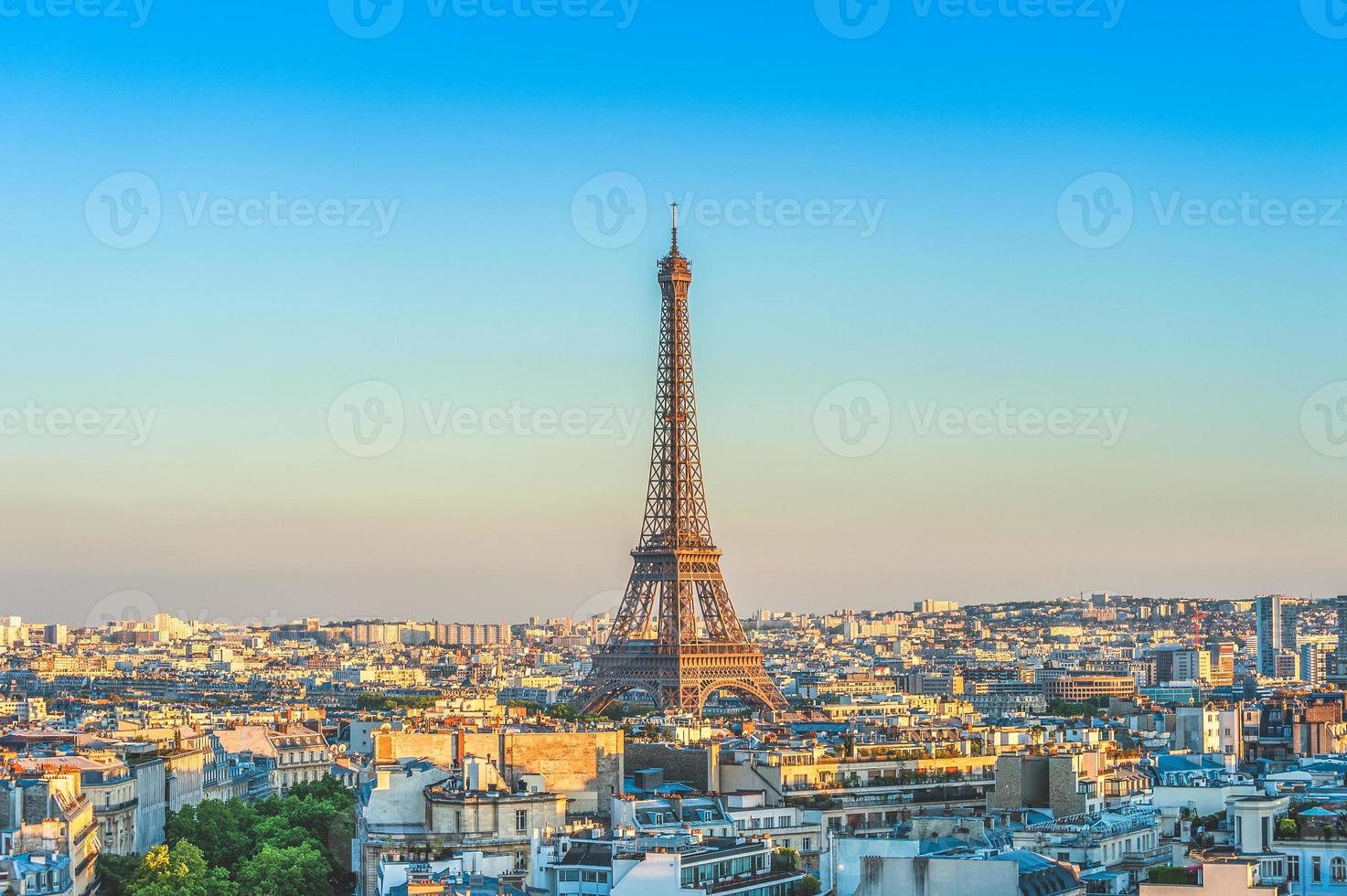 Skyline of Paris with Eiffel tower at dusk photo