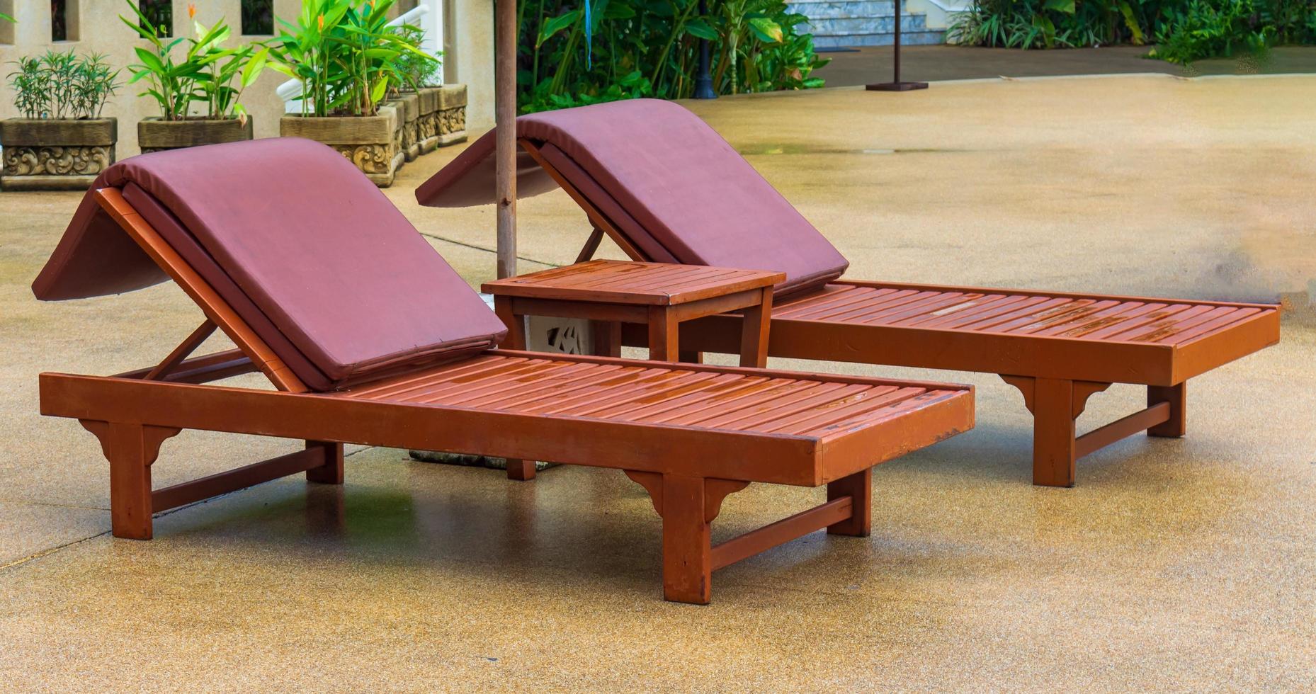 Leisure chairs at  swimming pool photo