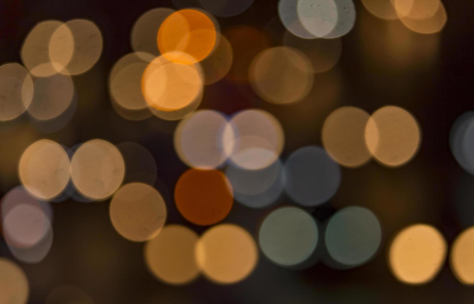 Abstract glitter bokeh from car lights to riot at night beautiful for the background photo