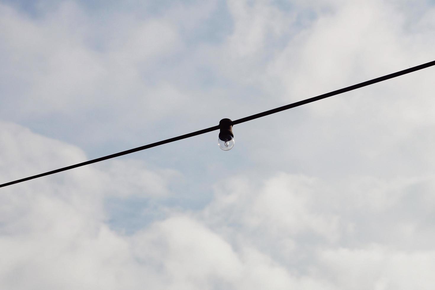 light bulb and blue sky photo