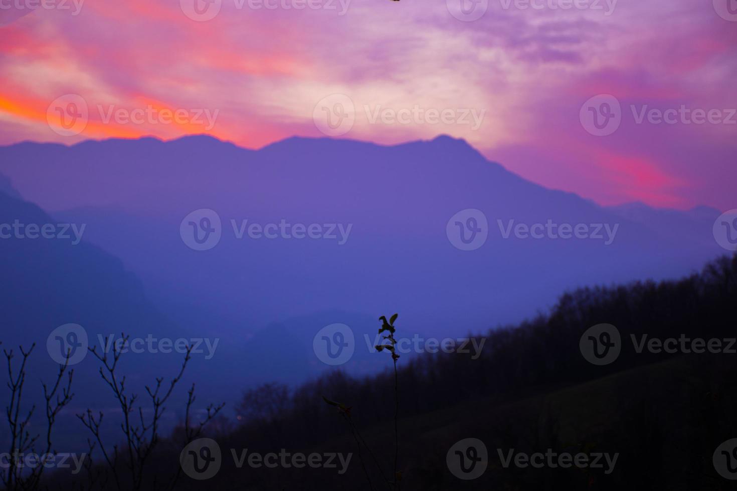 Colorful sunset over mountains photo