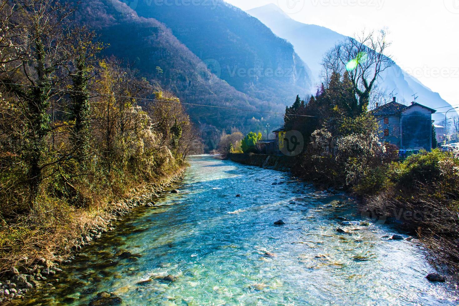 House by a stream photo