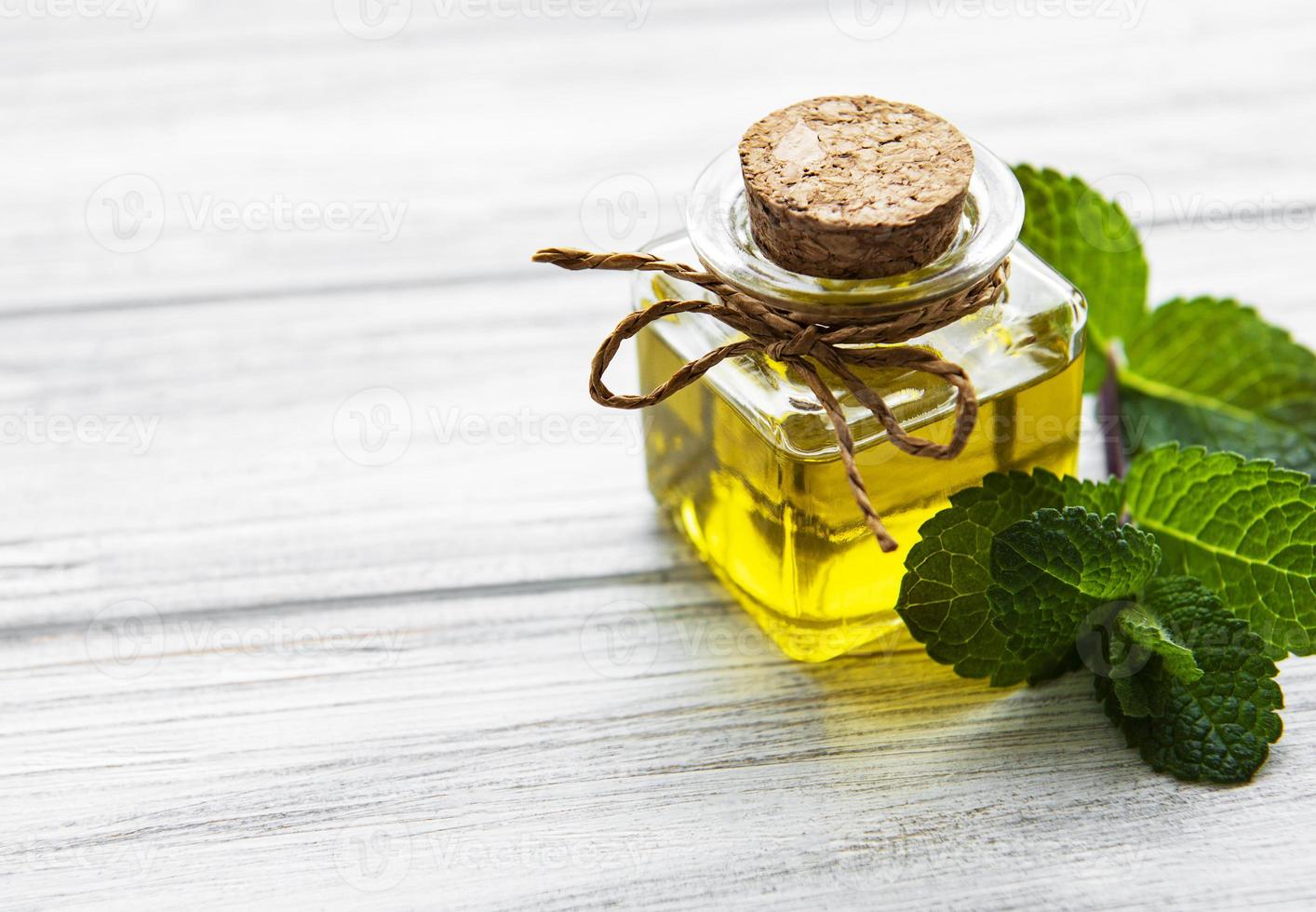 Essential aroma oil with mint photo