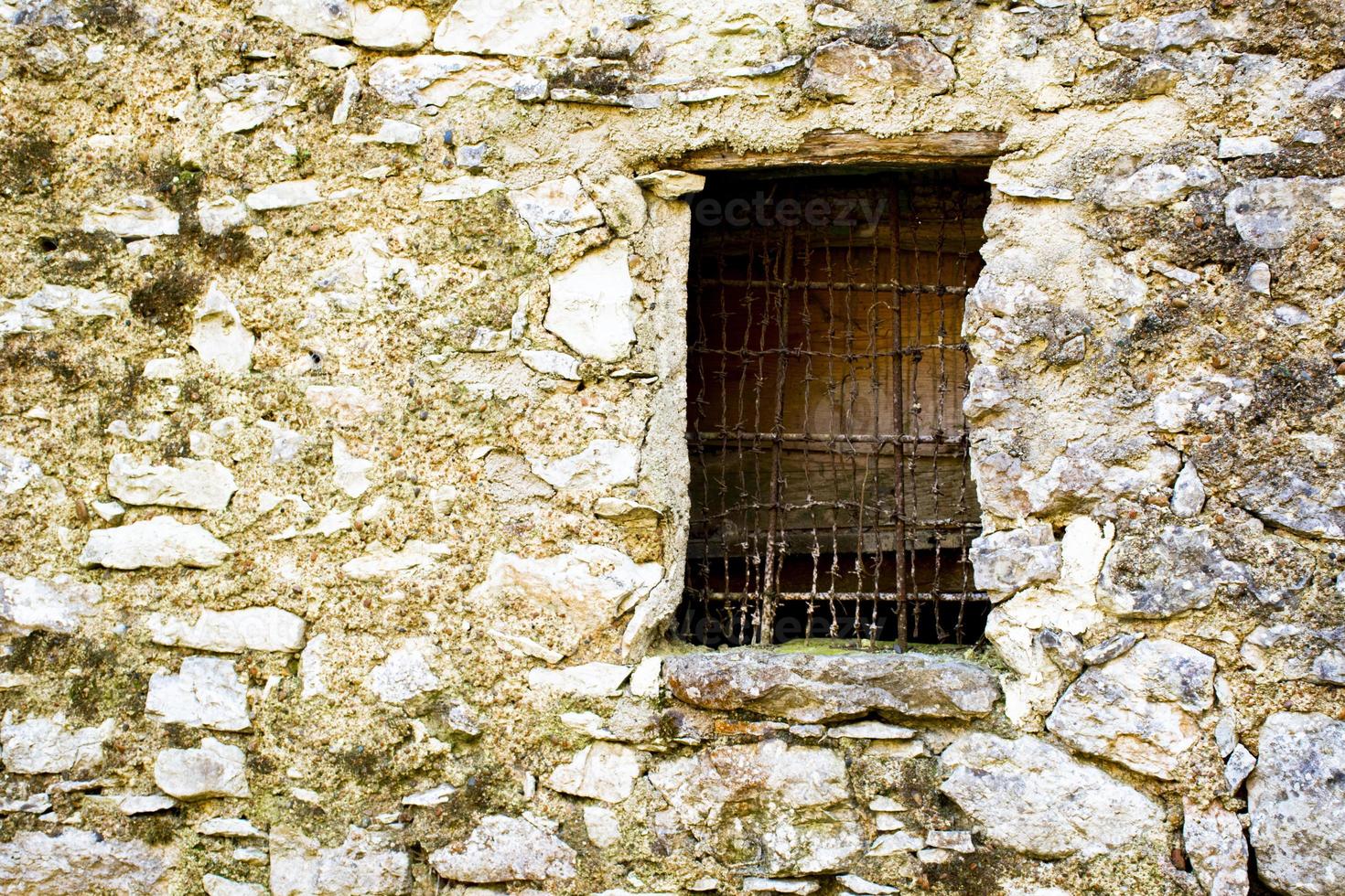 Old window with wire frame photo