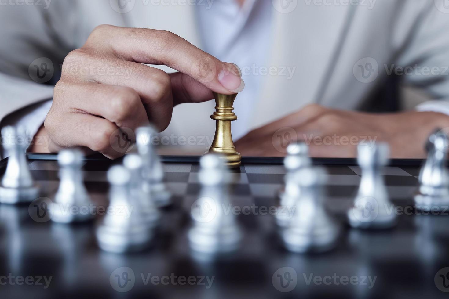 Business competition concept with table chess game photo