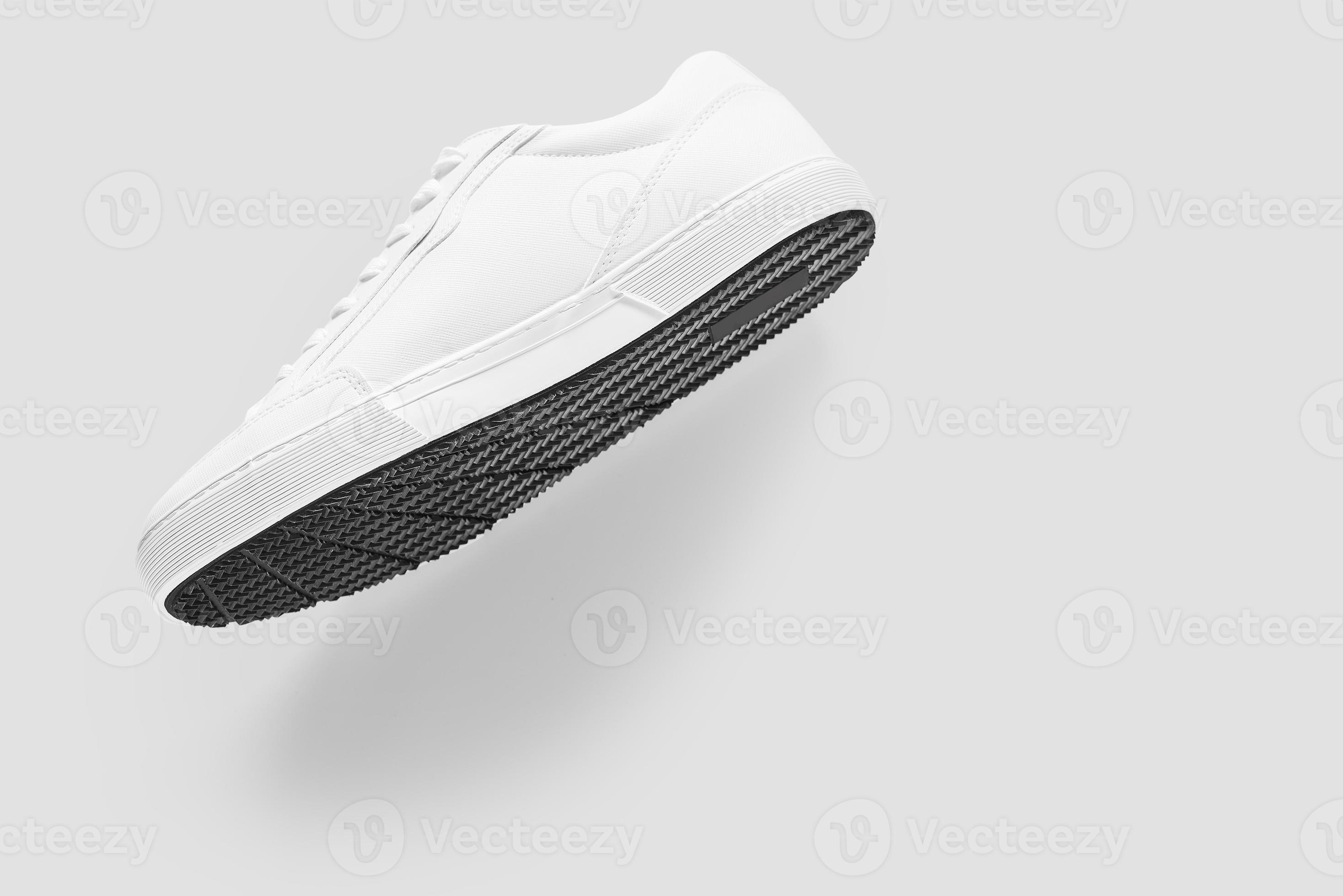 Download Mockup Of A Generic Sneaker Floating Against Plain Background 2572012 Stock Photo At Vecteezy