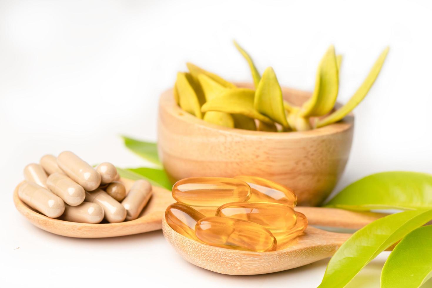 Alternative medicine herbal organic capsule with vitamin E omega 3 fish oil photo