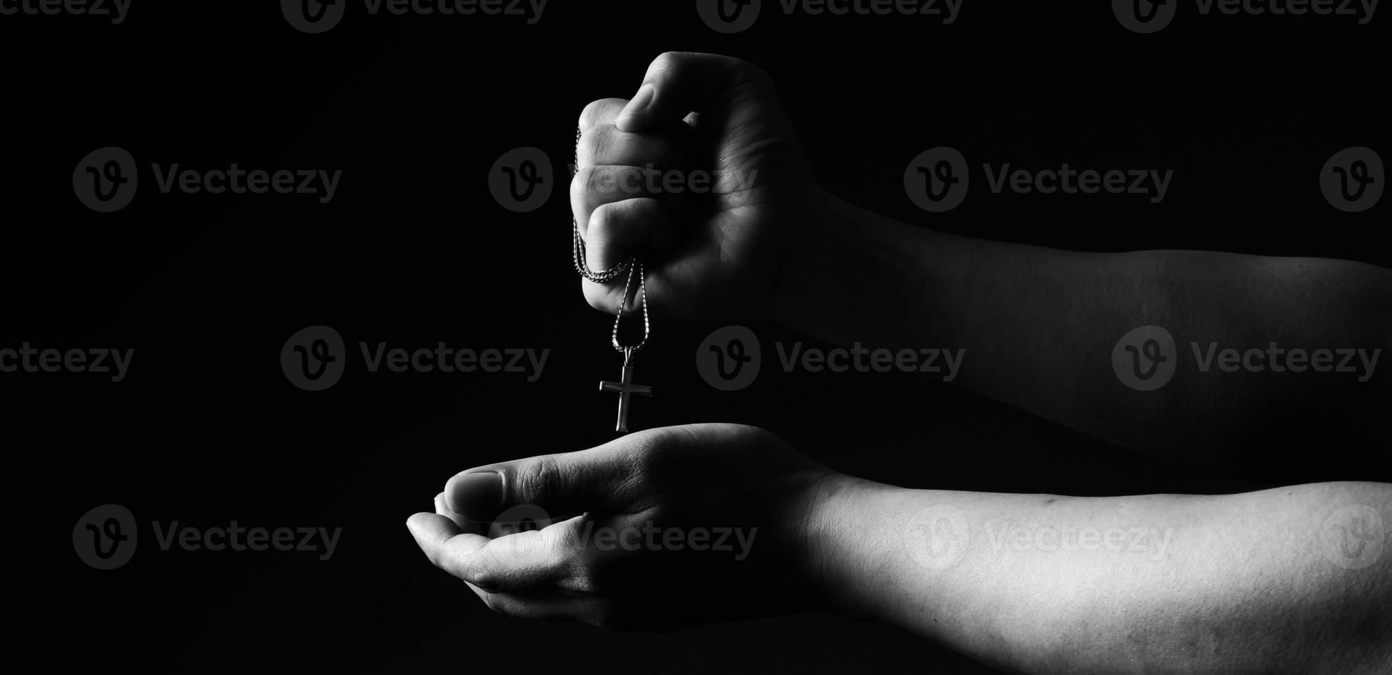 Praying with a rosary photo