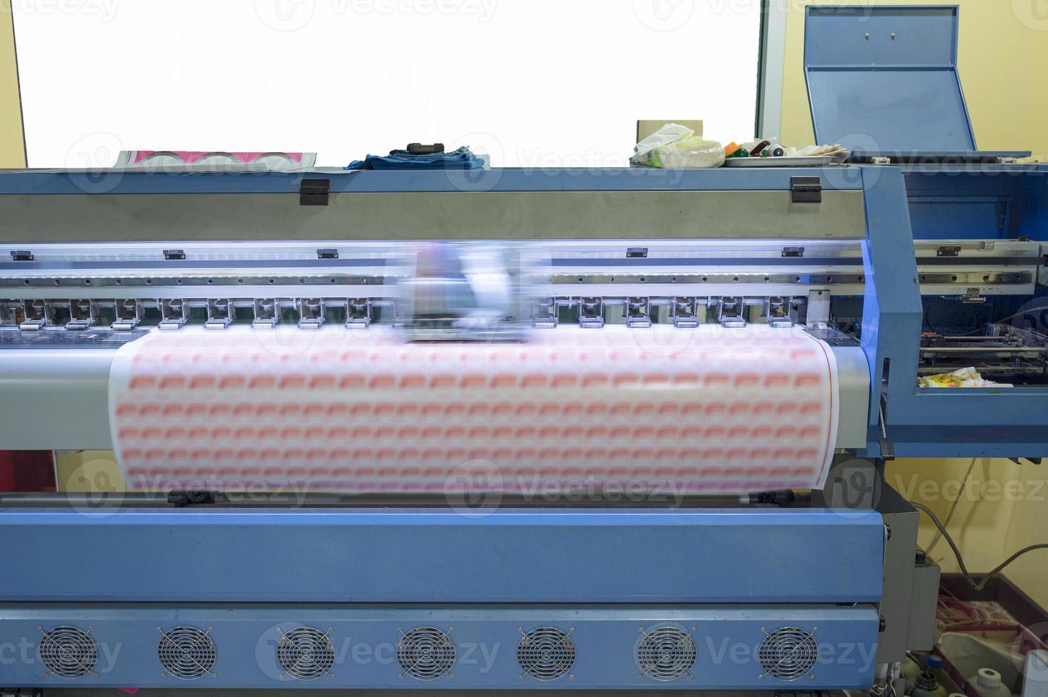 Large format inkjet printer working on sticker sheets photo