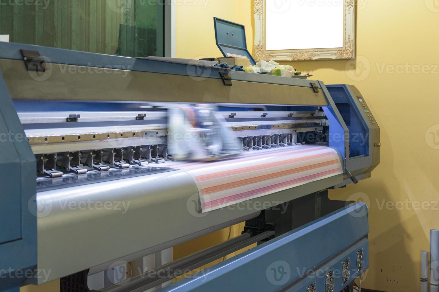 Large format inkjet printer working on sticker sheets photo