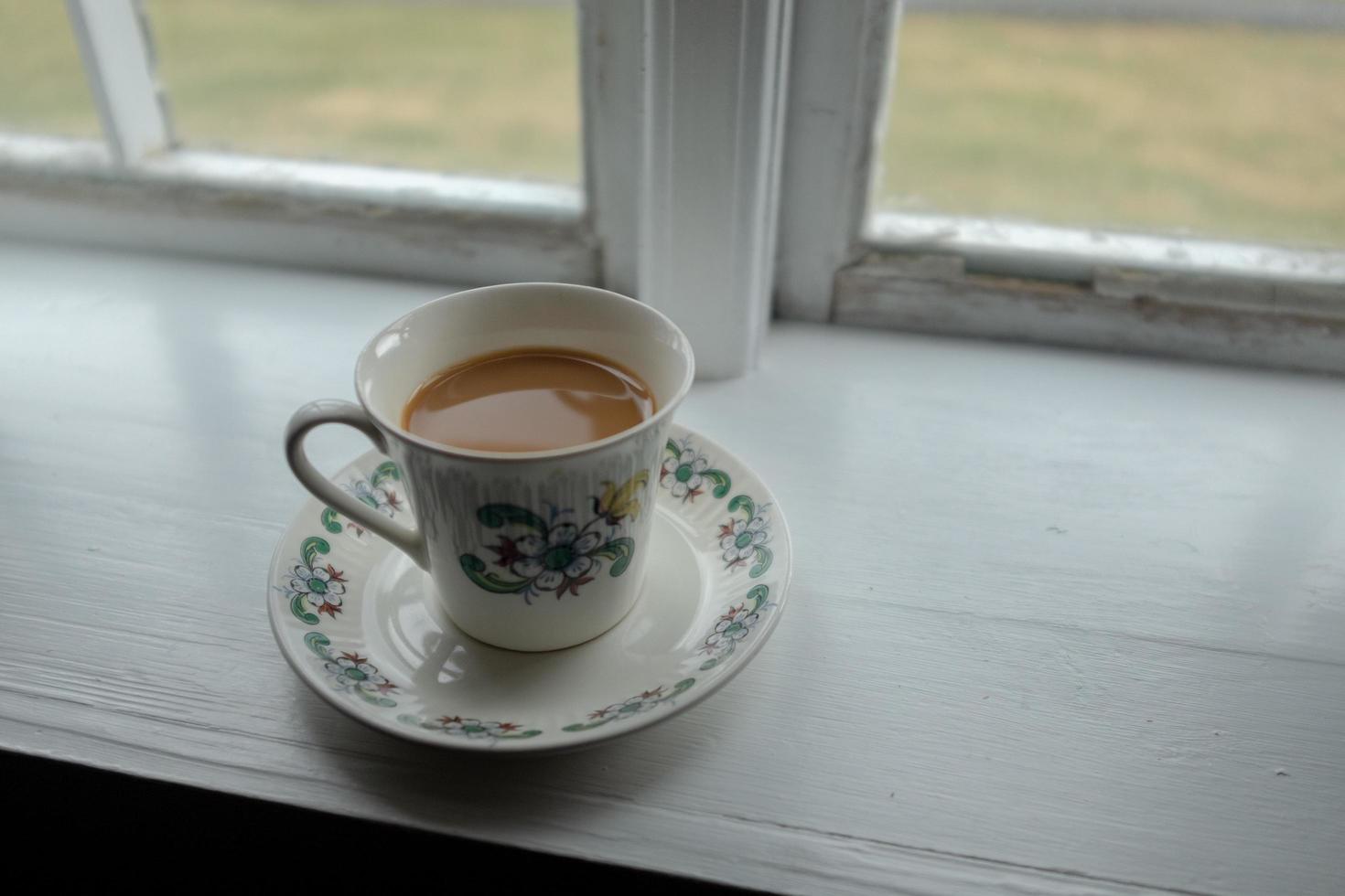 Coffee in teacup photo