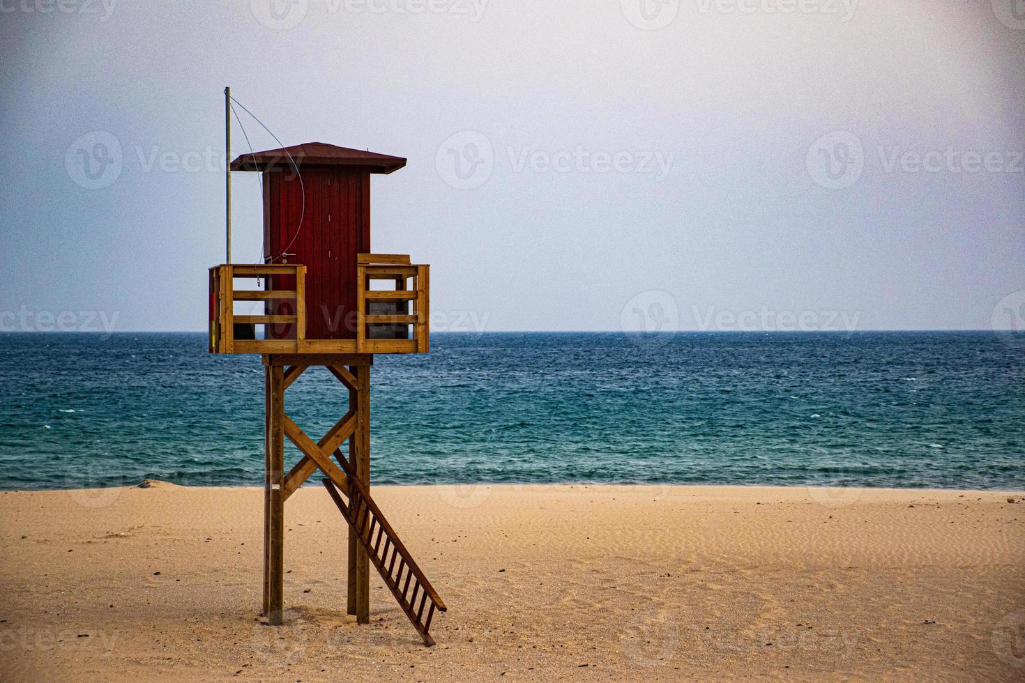 Lifeguard hut and beach photo