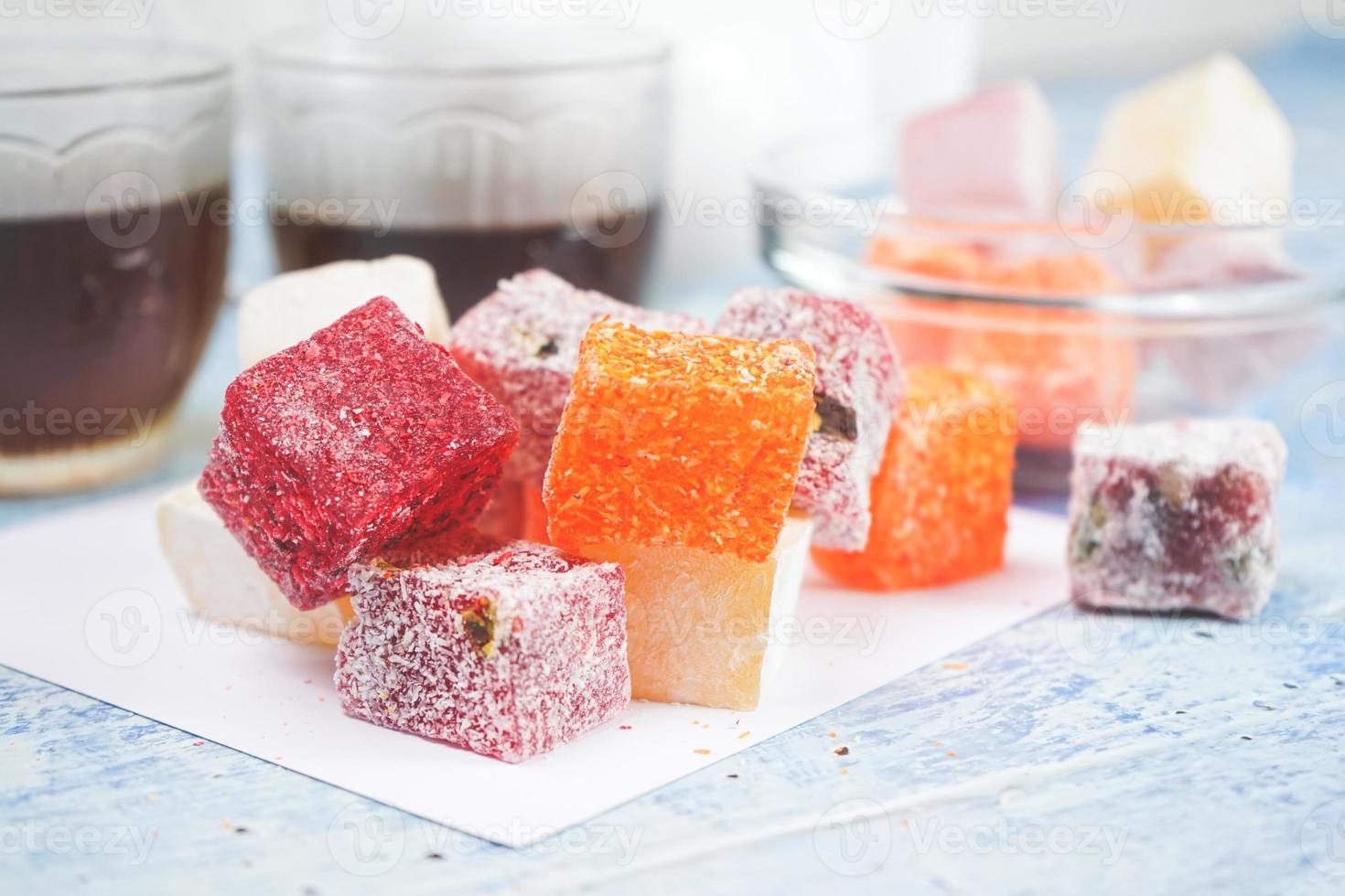 Delicious turkish delights with black tea photo