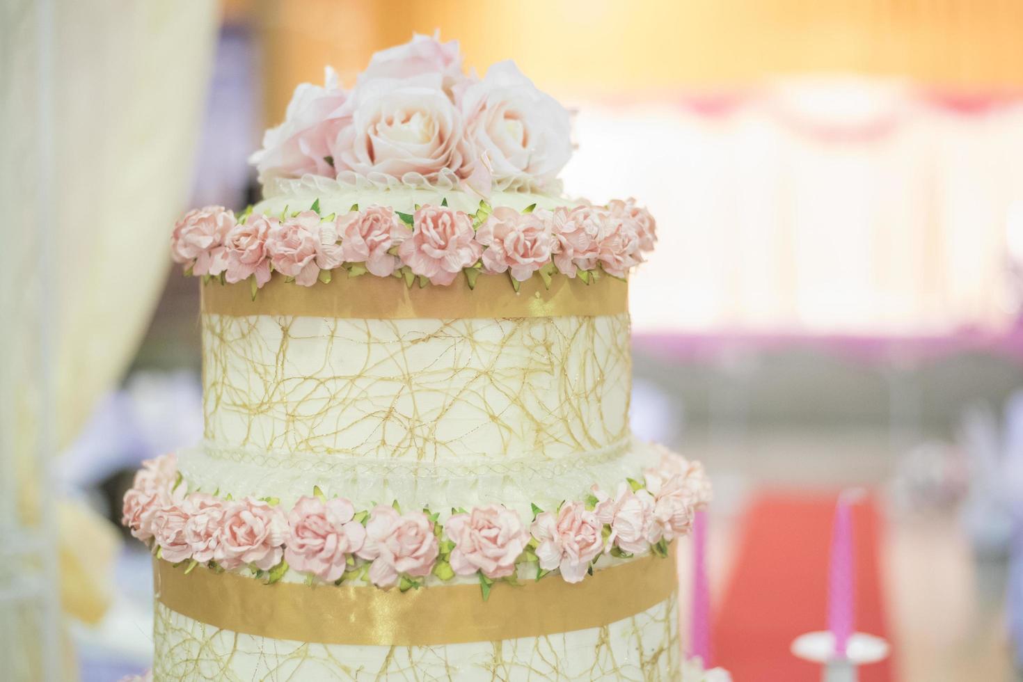 White wedding cake with flower photo