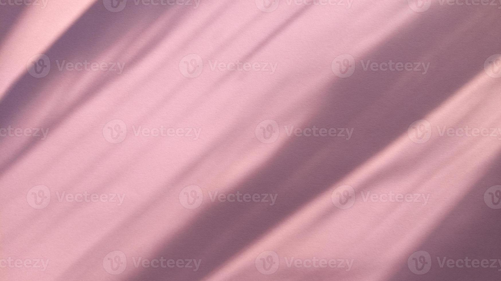 Diagonal shadows on pastel texture pink paper. Abstract backgorund. Stock photo. photo