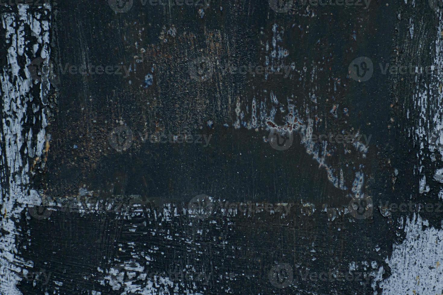 old worn black background iron, dents and scratches structure photo