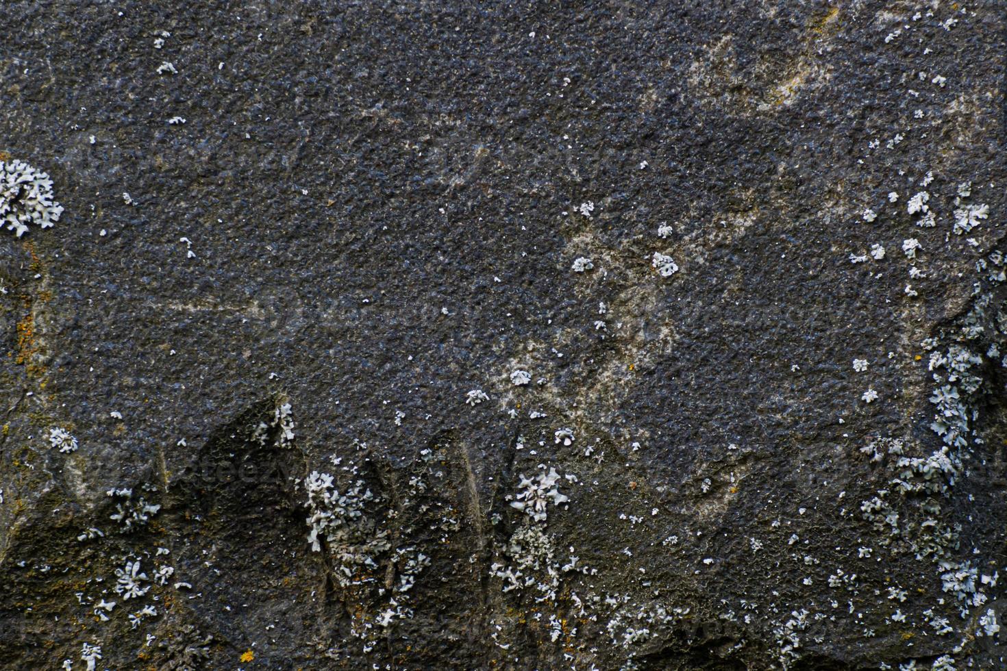 Textura de piedra negra con grietas y astillas, imagen de fondo foto